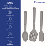 Set of three grey Tramontina India Softta silicone kitchen utensils including a slotted turner, spatula, and spoon.