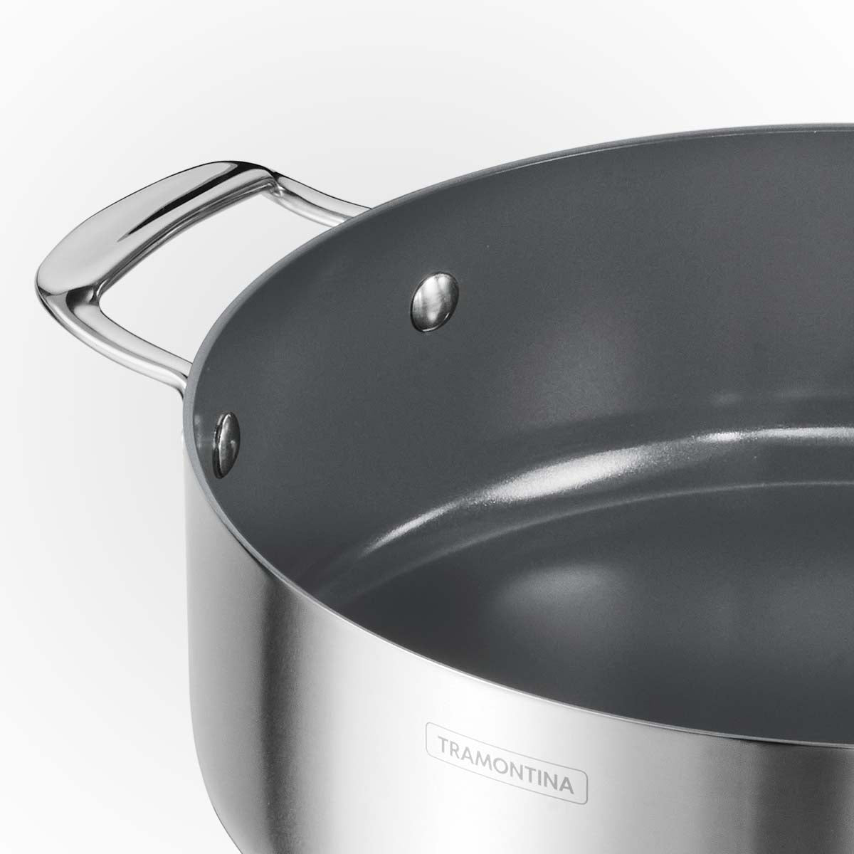 Tramontina India Fusao EX+ 24cm ceramic stainless steel tri-ply biryani pot with lid, 4.8L capacity, ideal for cooking flavorful dishes.