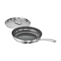 Tramontina India Fusao EX+ 26cm ceramic stainless steel tri-ply fry pan with stainless steel lid on a kitchen countertop.