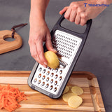 Utilitá stainless steel grater with polypropylene handle and non-slip rubber base in black - Tramontina India