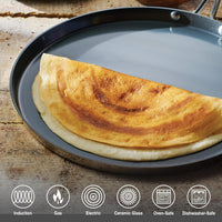 Tramontina India Fusao EX+ 28cm ceramic stainless steel tri-ply dosa Tawa with 4mm thickness, round cooking surface and sturdy handle.